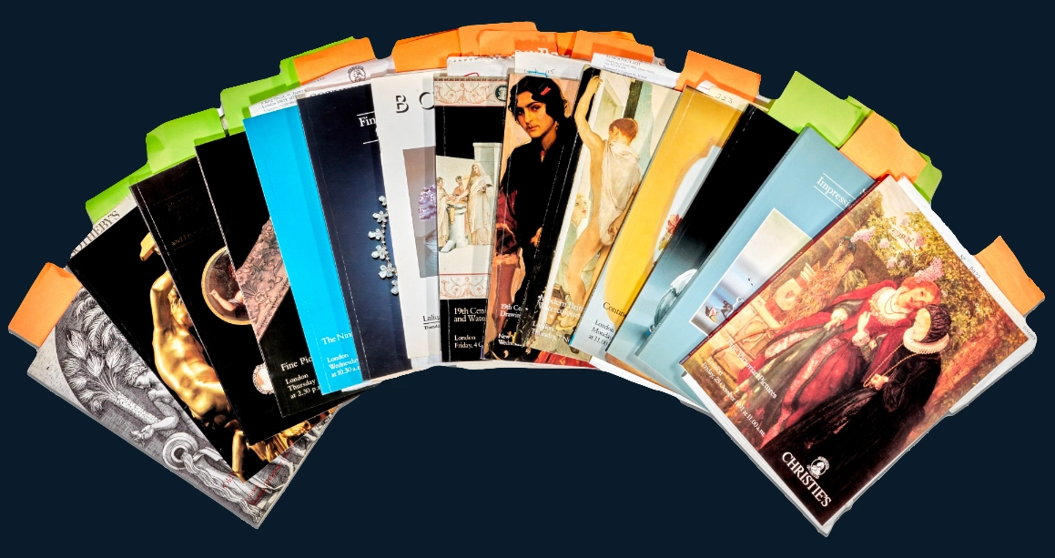 Collection of vintage catalogs and brochures fanned out