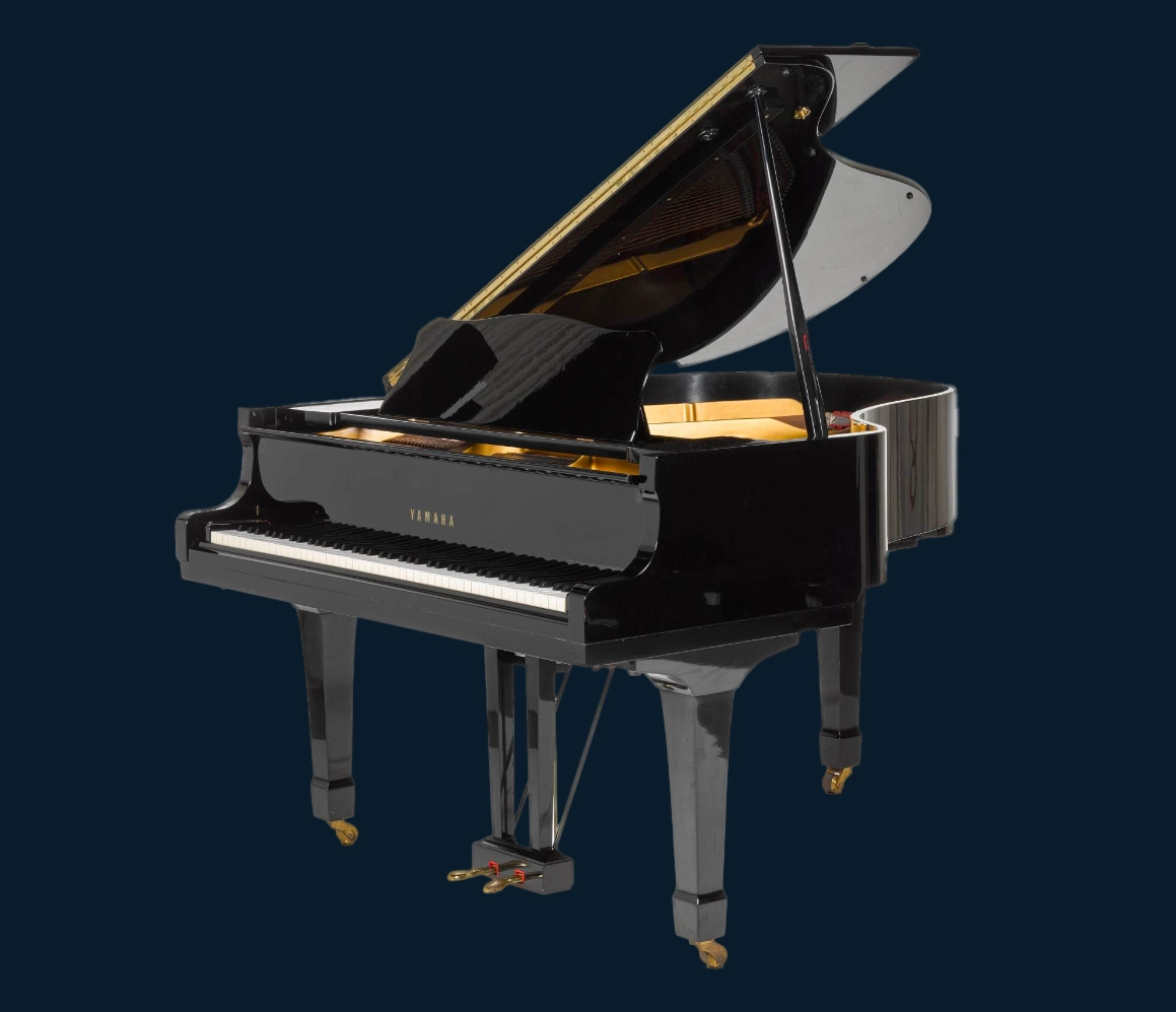 Grand piano in elegant, softly lit concert space
