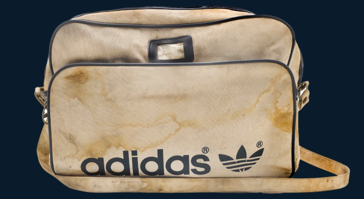 Close-up of Adidas logo on fabric material